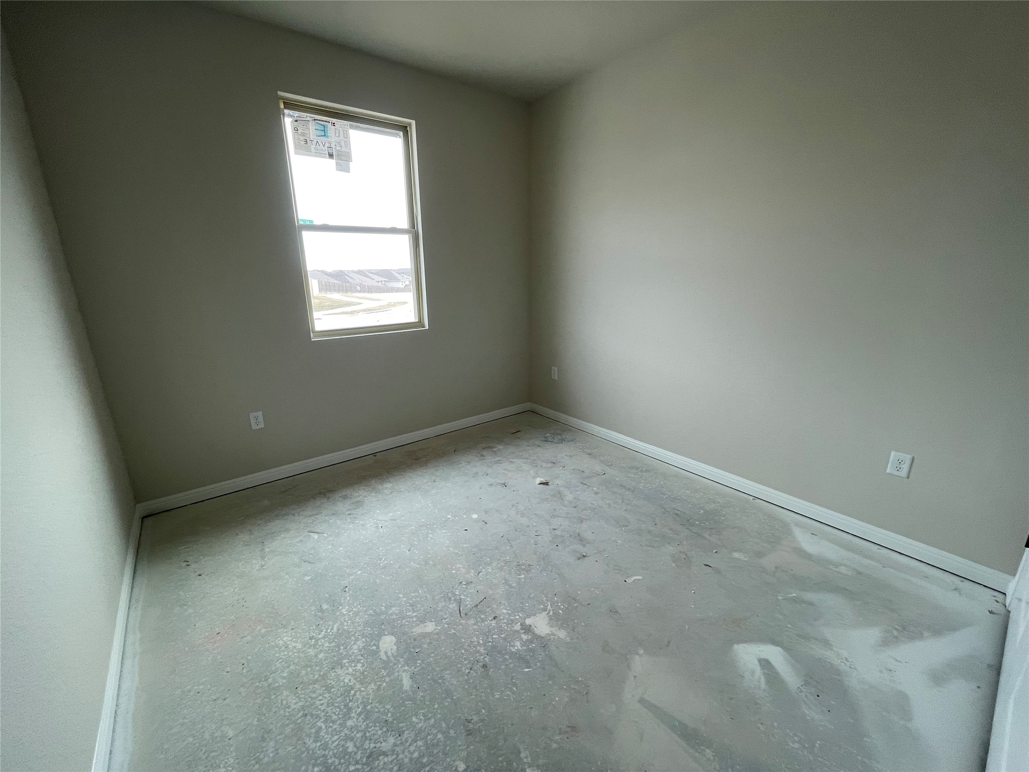 601 Palo Brea Loop Hutto, TX 78634 - Photo 8 of 39 an empty room with a window