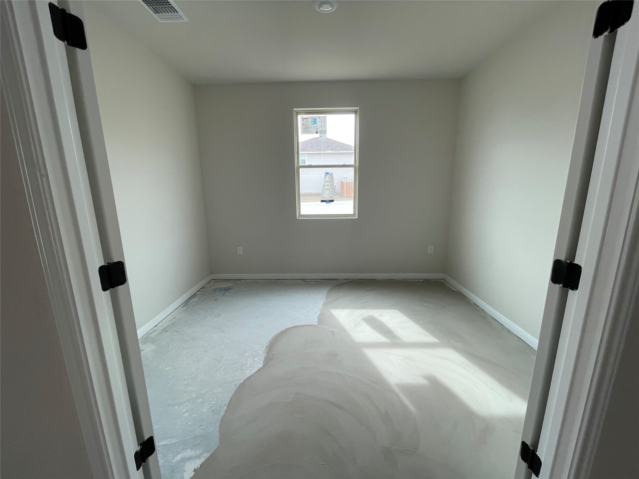 601 Palo Brea Loop Hutto, TX 78634 - Photo 10 of 39 an empty room with windows