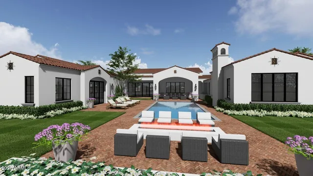 a view of house with yard and outdoor seating