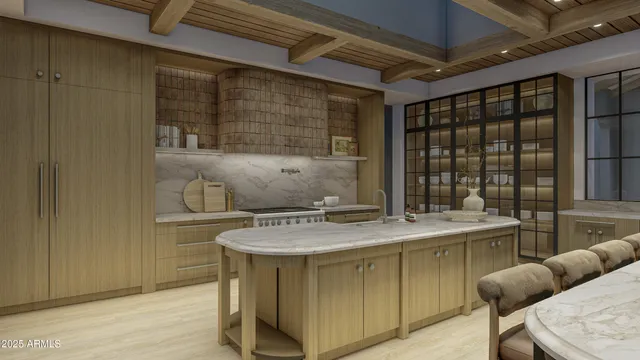 a kitchen with a table and chairs in it