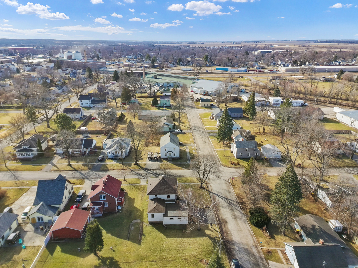 607 West Burbank Street Harvard, IL 60033 - Photo 21 of 22 an aerial view of residential building with parking space