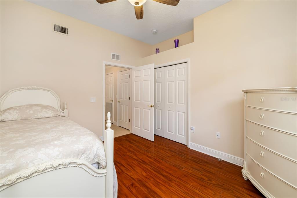8407 Miramar Way Lakewood Ranch, FL 34202 - Photo 16 of 83 a bedroom with a bed and a dresser