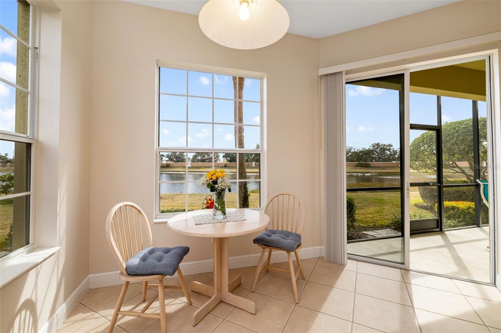 8407 Miramar Way Lakewood Ranch, FL 34202 - Photo 28 of 83 a view of a dining room with furniture window and outside view