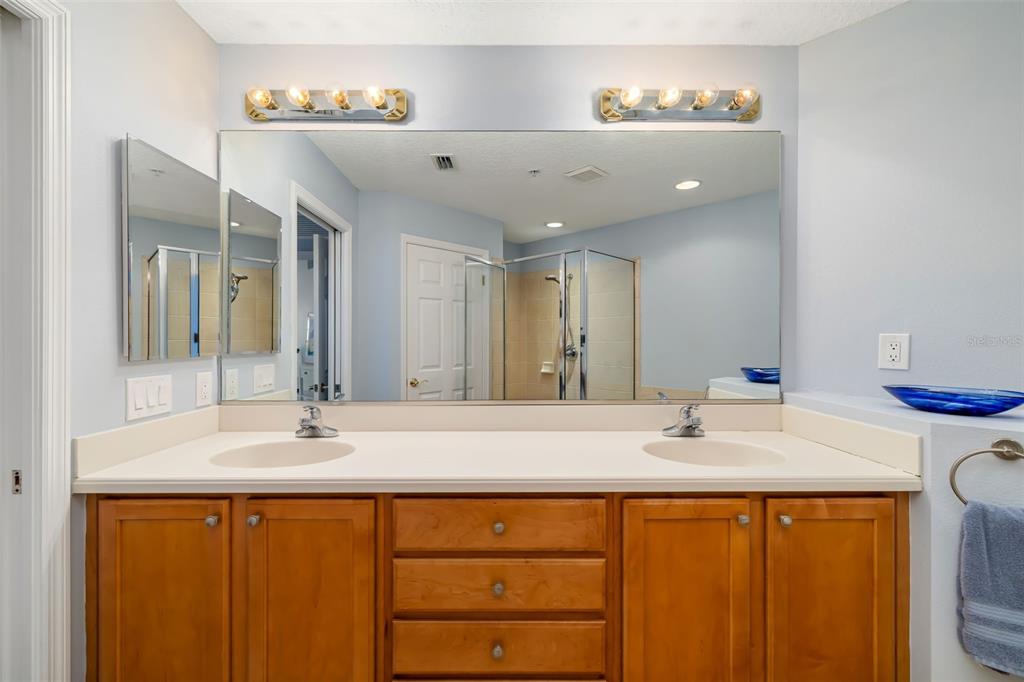 8407 Miramar Way Lakewood Ranch, FL 34202 - Photo 34 of 83 a bathroom with a sink and a mirror