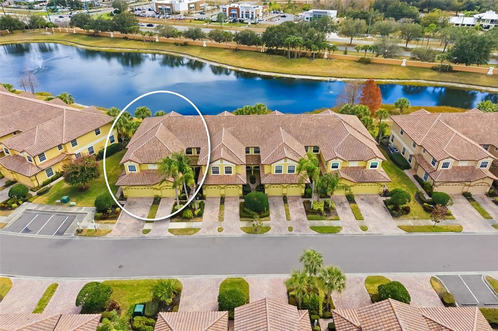 8407 Miramar Way Lakewood Ranch, FL 34202 - Photo 47 of 83 an aerial view of a house with outdoor space and a lake view