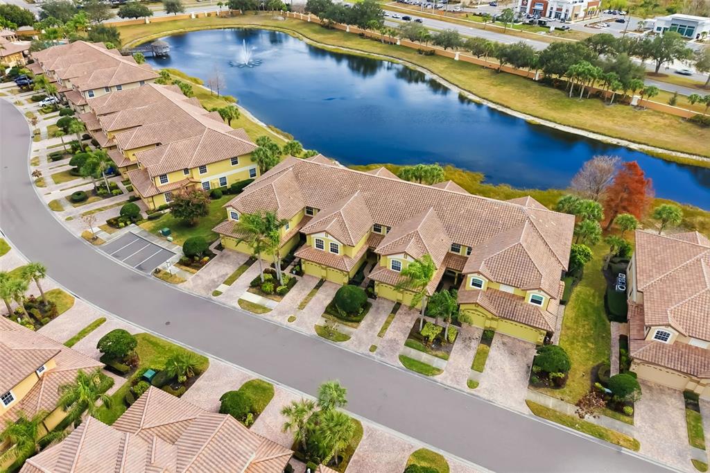 8407 Miramar Way Lakewood Ranch, FL 34202 - Photo 50 of 83 an aerial view of a house with a lake view