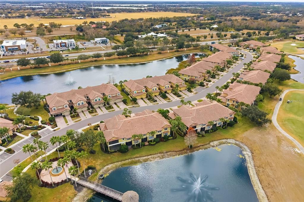 8407 Miramar Way Lakewood Ranch, FL 34202 - Photo 53 of 83 an aerial view of residential houses with outdoor space