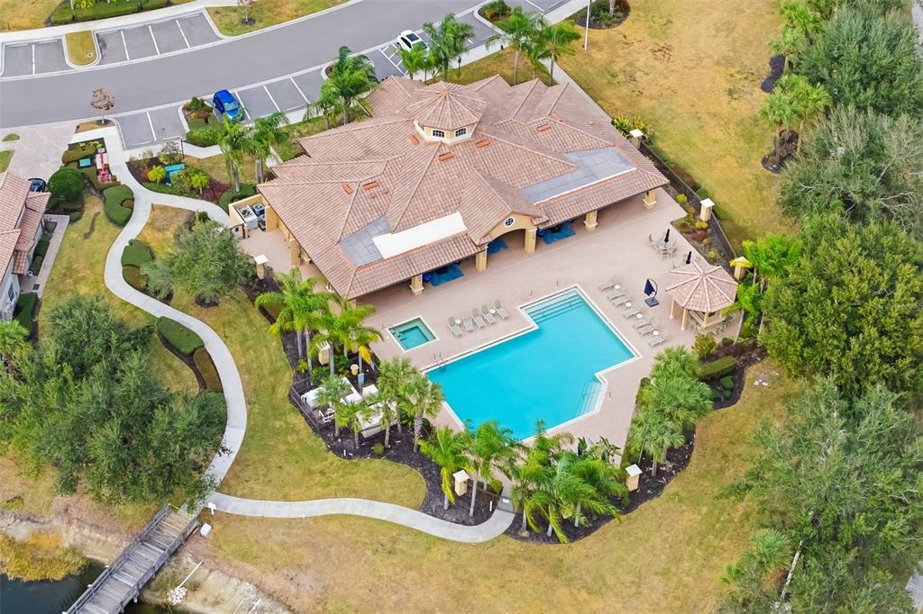8407 Miramar Way Lakewood Ranch, FL 34202 - Photo 61 of 83 an aerial view of a house with a yard and garden