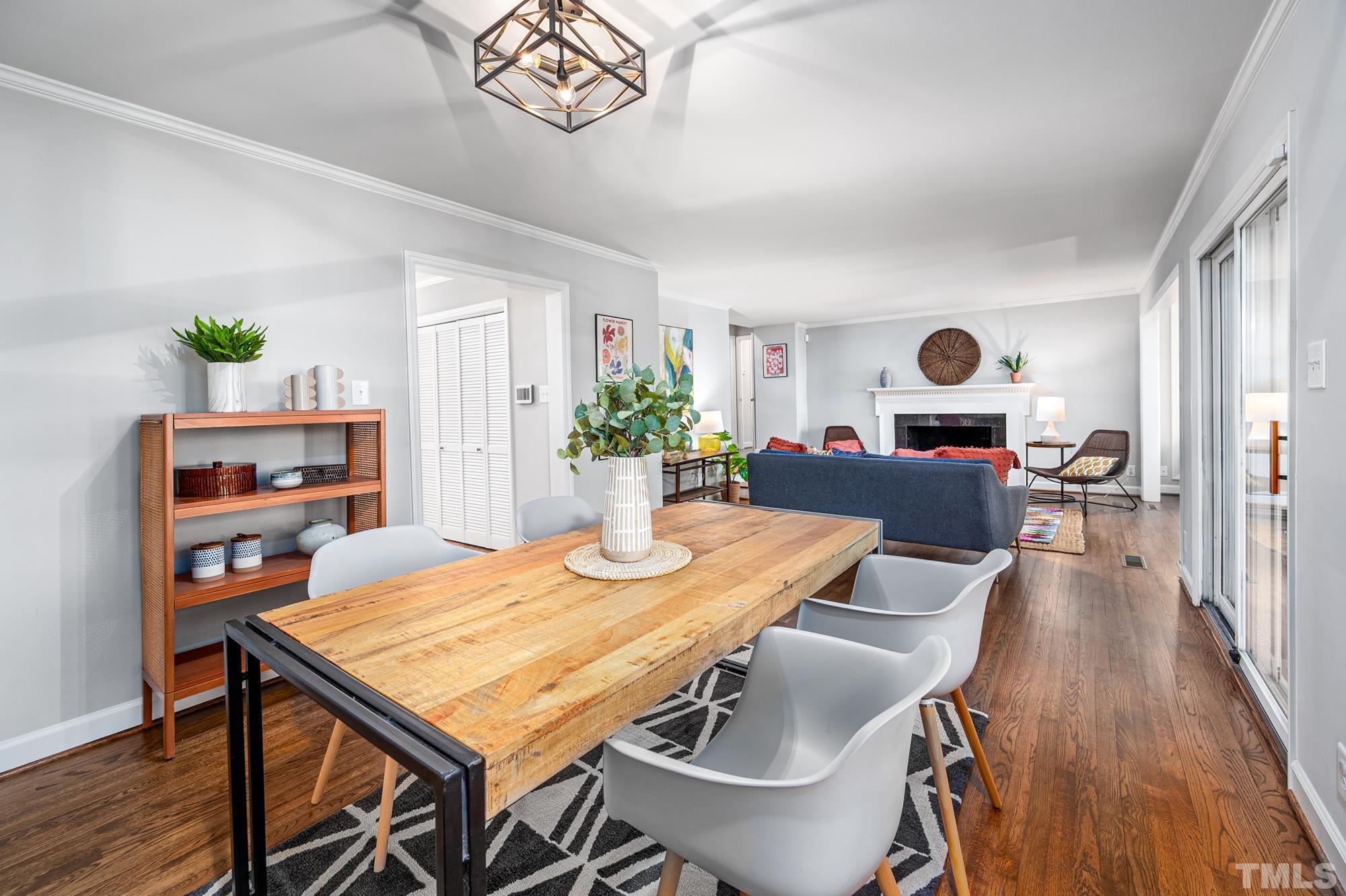 2910 Buckingham Road Durham, NC 27707 - Photo 11 of 30 a view of a dining room with furniture window and wooden floor