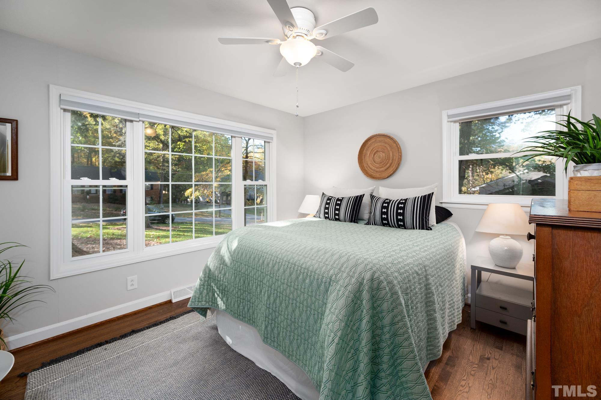 2910 Buckingham Road Durham, NC 27707 - Photo 17 of 30 a bedroom with a bed and a window