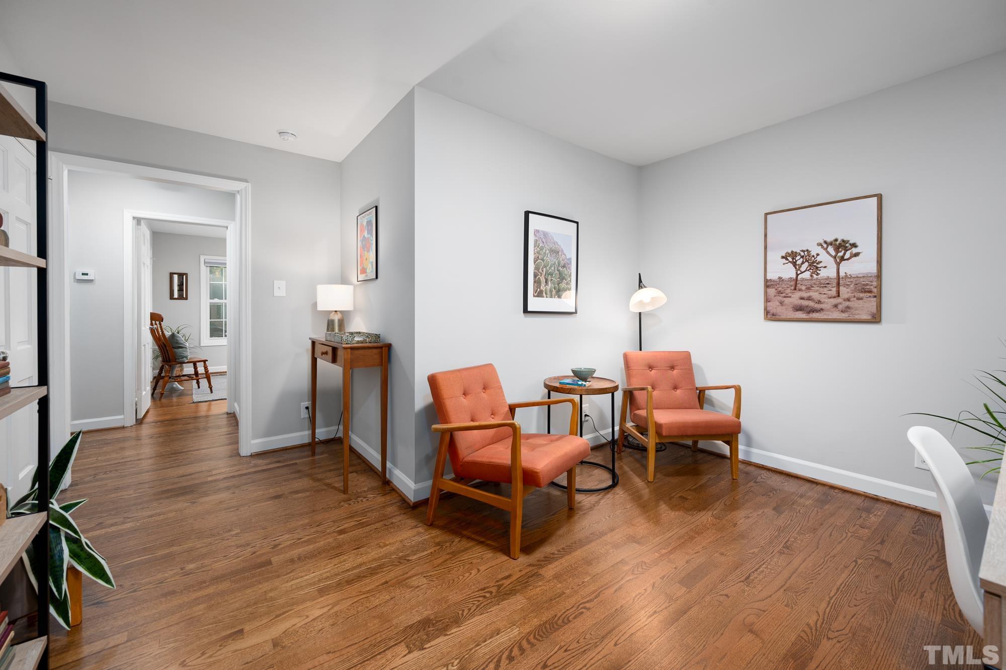 2910 Buckingham Road Durham, NC 27707 - Photo 20 of 30 a living room with furniture and a wooden floor