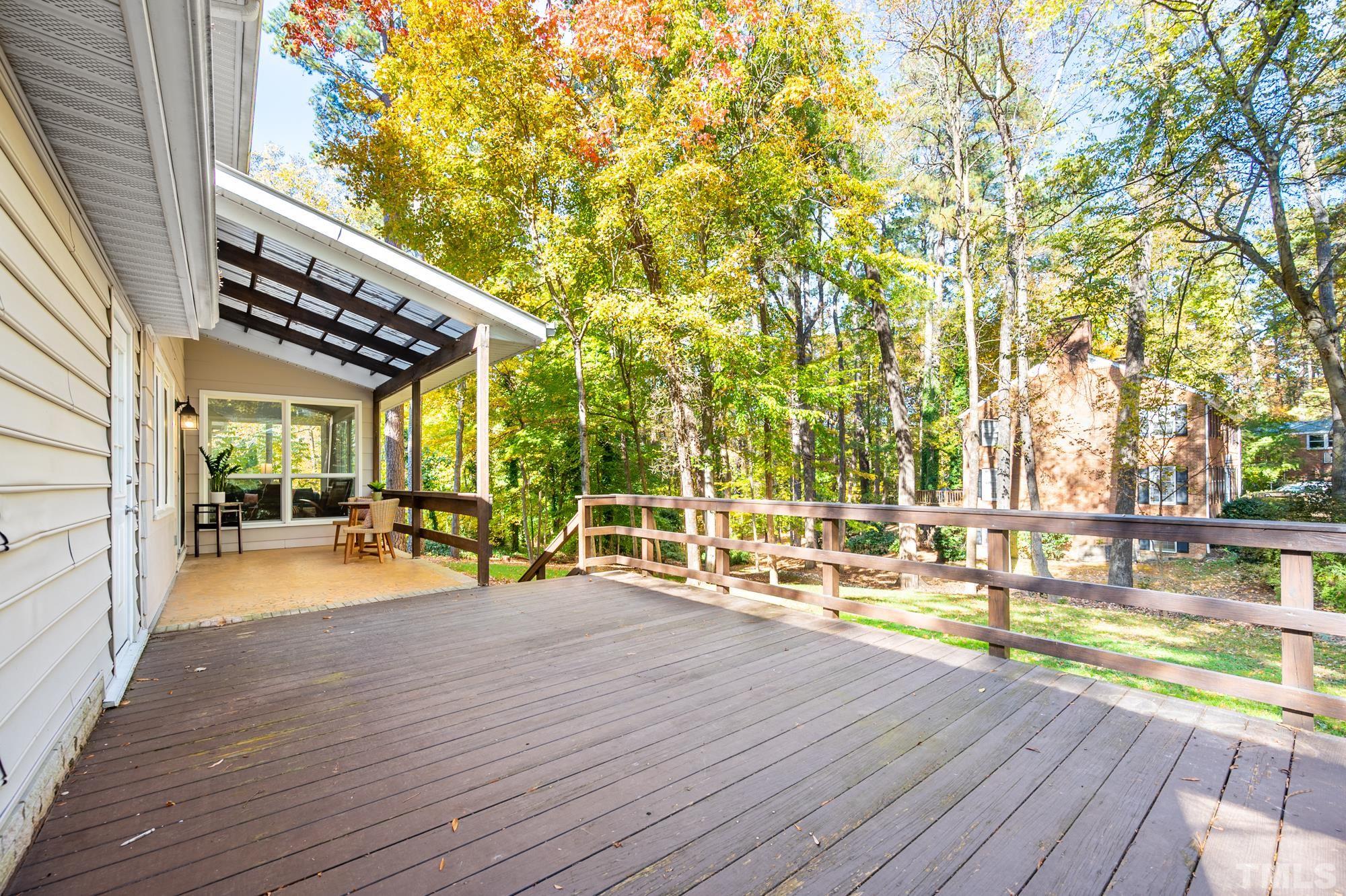 2910 Buckingham Road Durham, NC 27707 - Photo 27 of 30 a view of a swimming pool with a patio and wooden flooring