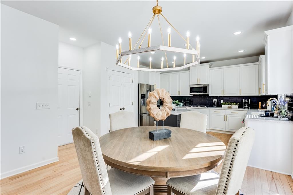 3135 Esplanade Circle Southwest Atlanta, GA 30311 - Photo 21 of 69 a view of a dining room with furniture