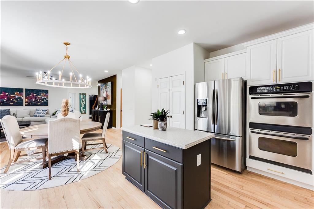 3135 Esplanade Circle Southwest Atlanta, GA 30311 - Photo 24 of 69 a kitchen with stainless steel appliances a stove a sink and a refrigerator