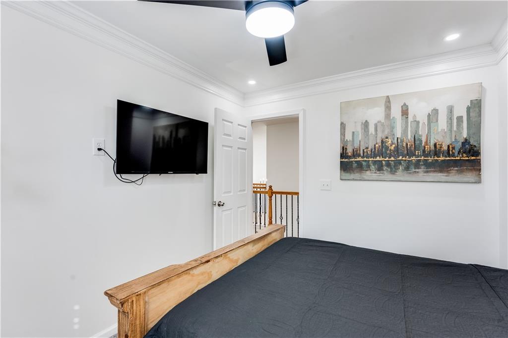 3135 Esplanade Circle Southwest Atlanta, GA 30311 - Photo 30 of 69 a living room with furniture and a flat screen tv