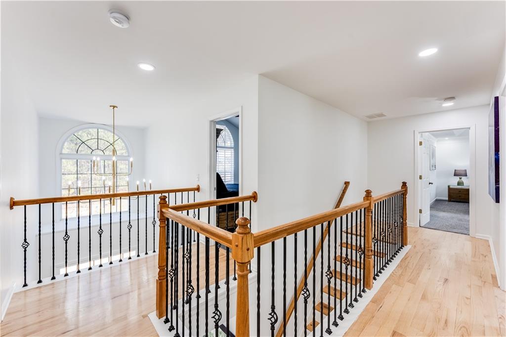 3135 Esplanade Circle Southwest Atlanta, GA 30311 - Photo 32 of 69 a view of staircase with lots of wooden floor and windows