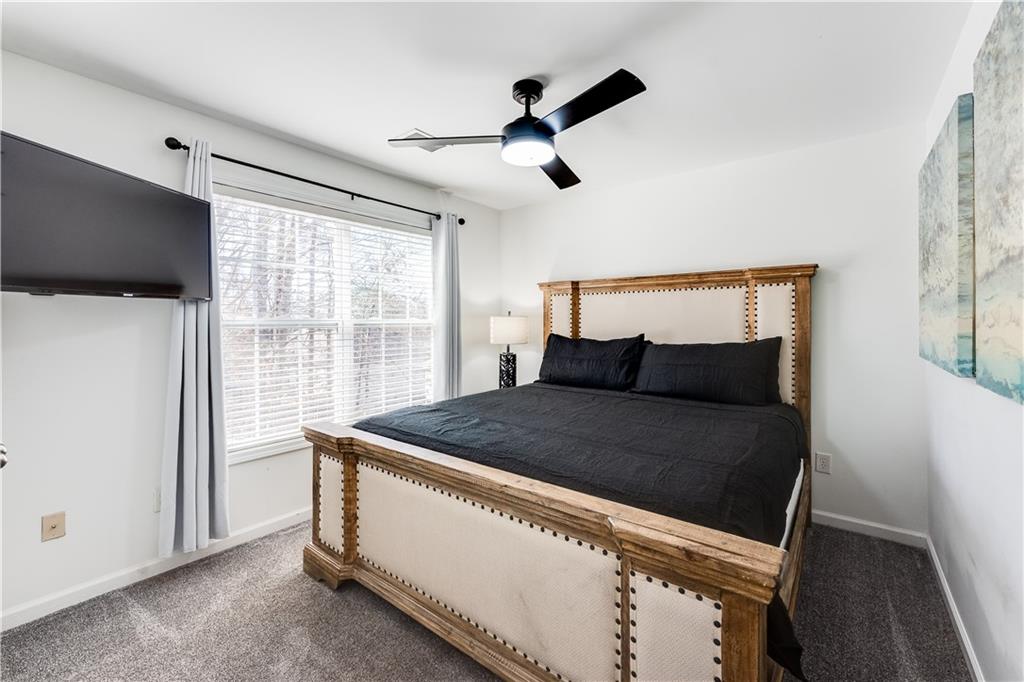 3135 Esplanade Circle Southwest Atlanta, GA 30311 - Photo 33 of 69 a bed sitting in a room next to a window