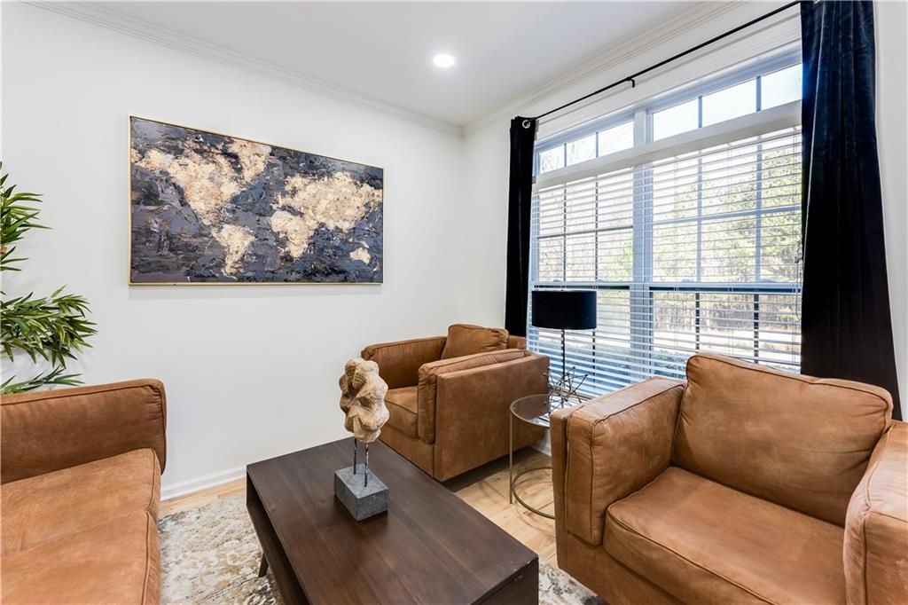 3135 Esplanade Circle Southwest Atlanta, GA 30311 - Photo 4 of 69 a living room with furniture and a large window