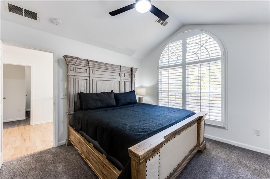 3135 Esplanade Circle Southwest Atlanta, GA 30311 - Photo 42 of 69 a bed sitting in a spacious bedroom next to a window