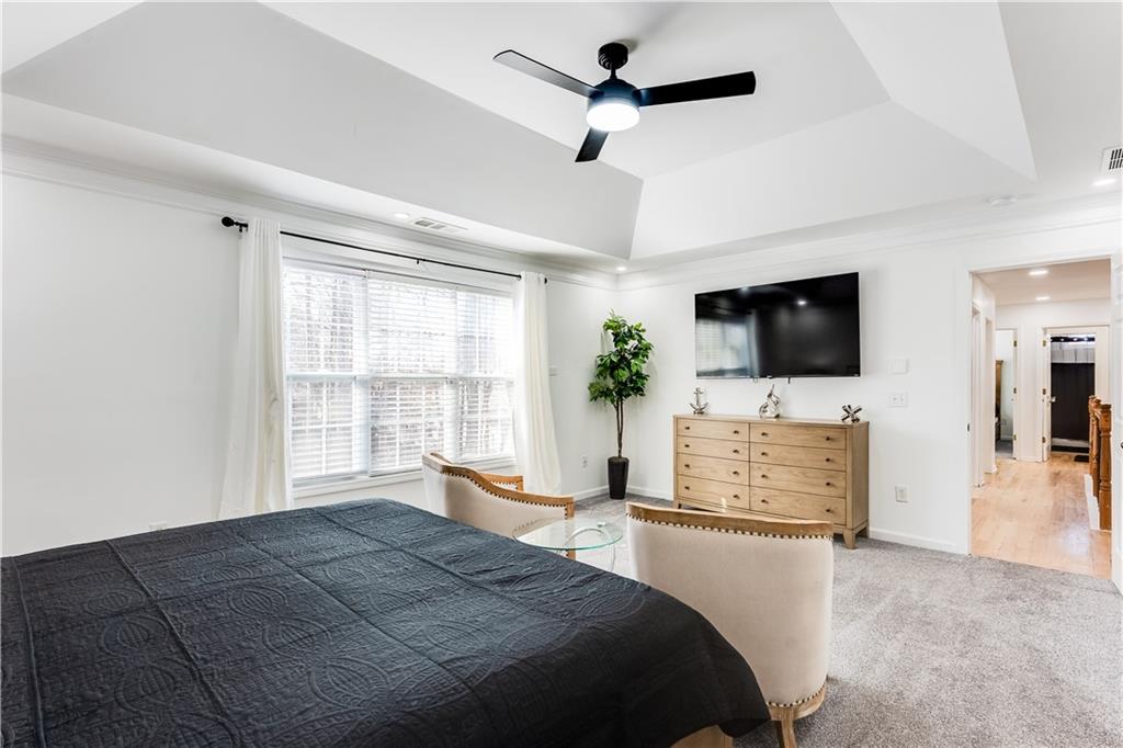 3135 Esplanade Circle Southwest Atlanta, GA 30311 - Photo 46 of 69 a bedroom with a bed and a flat screen tv