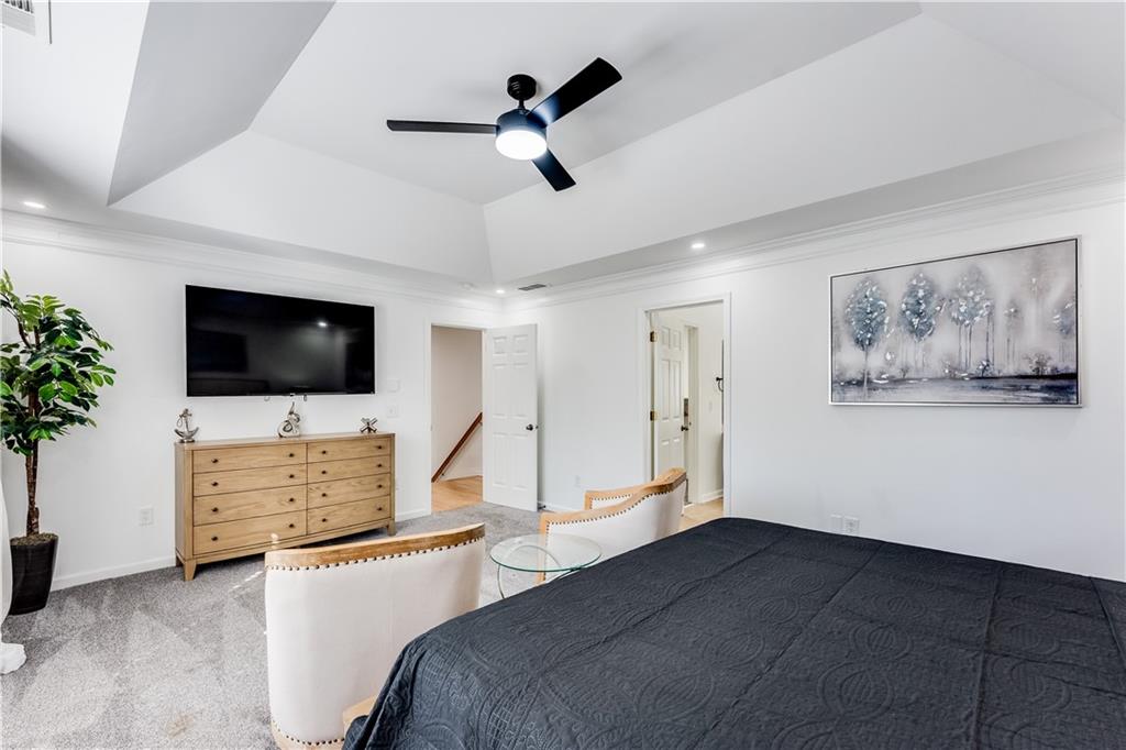 3135 Esplanade Circle Southwest Atlanta, GA 30311 - Photo 47 of 69 a bedroom with furniture and flat screen tv