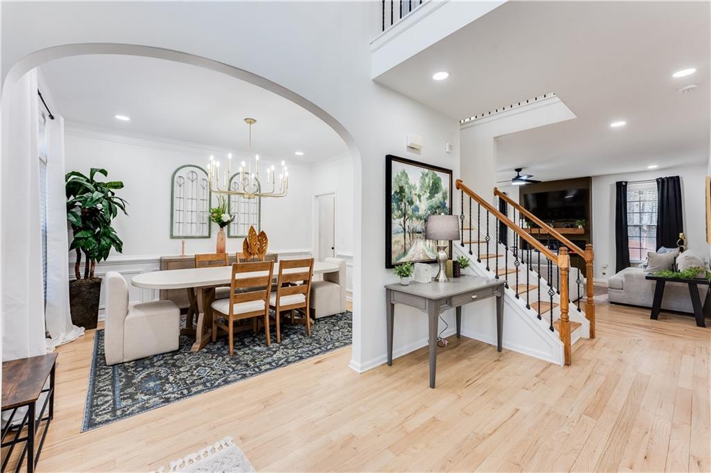 3135 Esplanade Circle Southwest Atlanta, GA 30311 - Photo 6 of 69 a dining room with furniture entryway and wooden floor