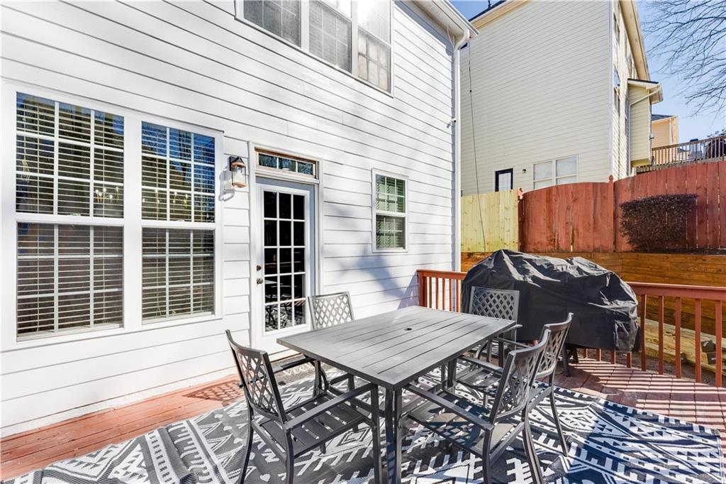 3135 Esplanade Circle Southwest Atlanta, GA 30311 - Photo 67 of 69 a view of a dinning table and chairs in the patio