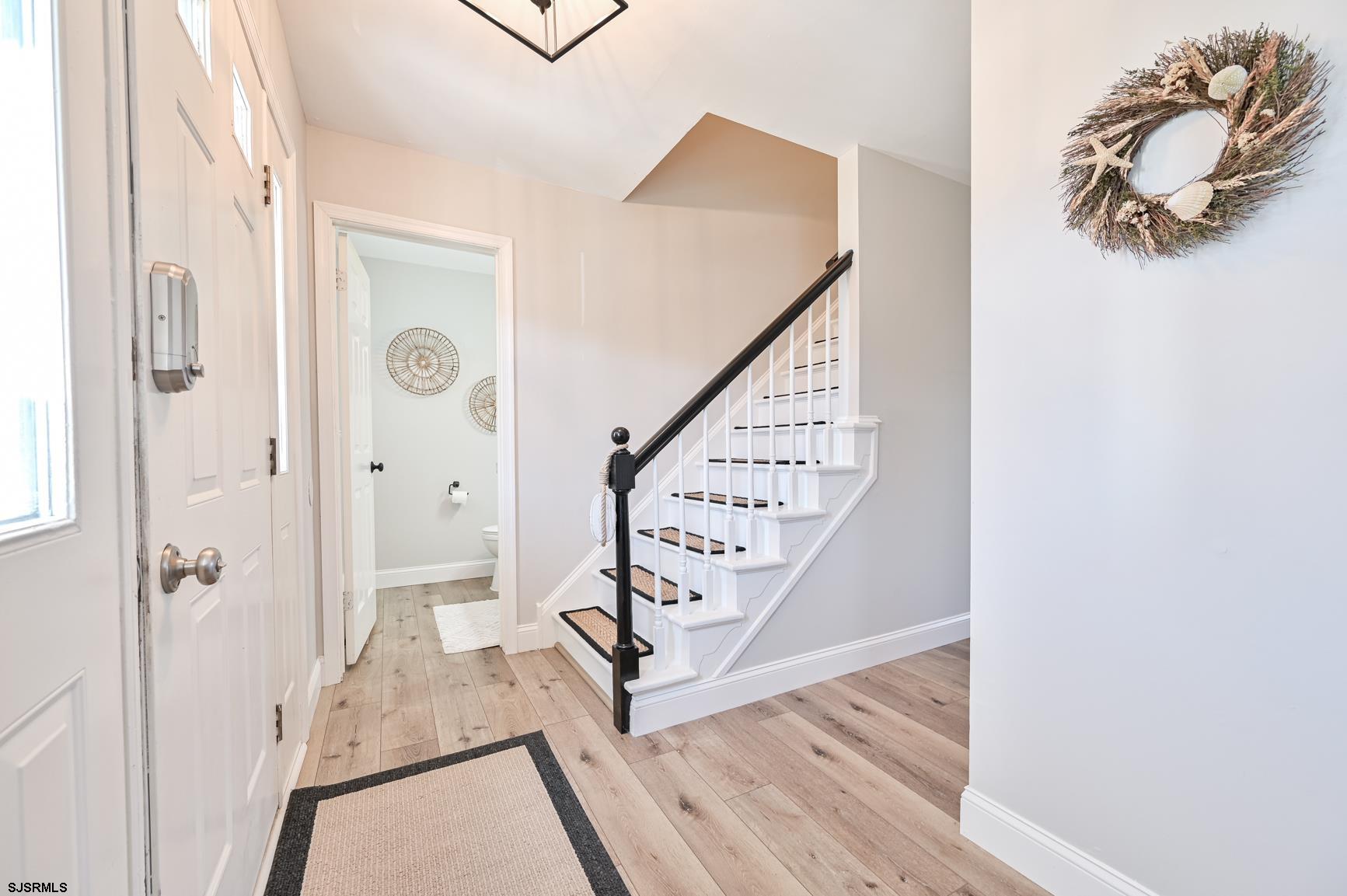 221 Hagen Road Brigantine, NJ 08203 - Photo 17 of 32 a view of entryway with wooden floor