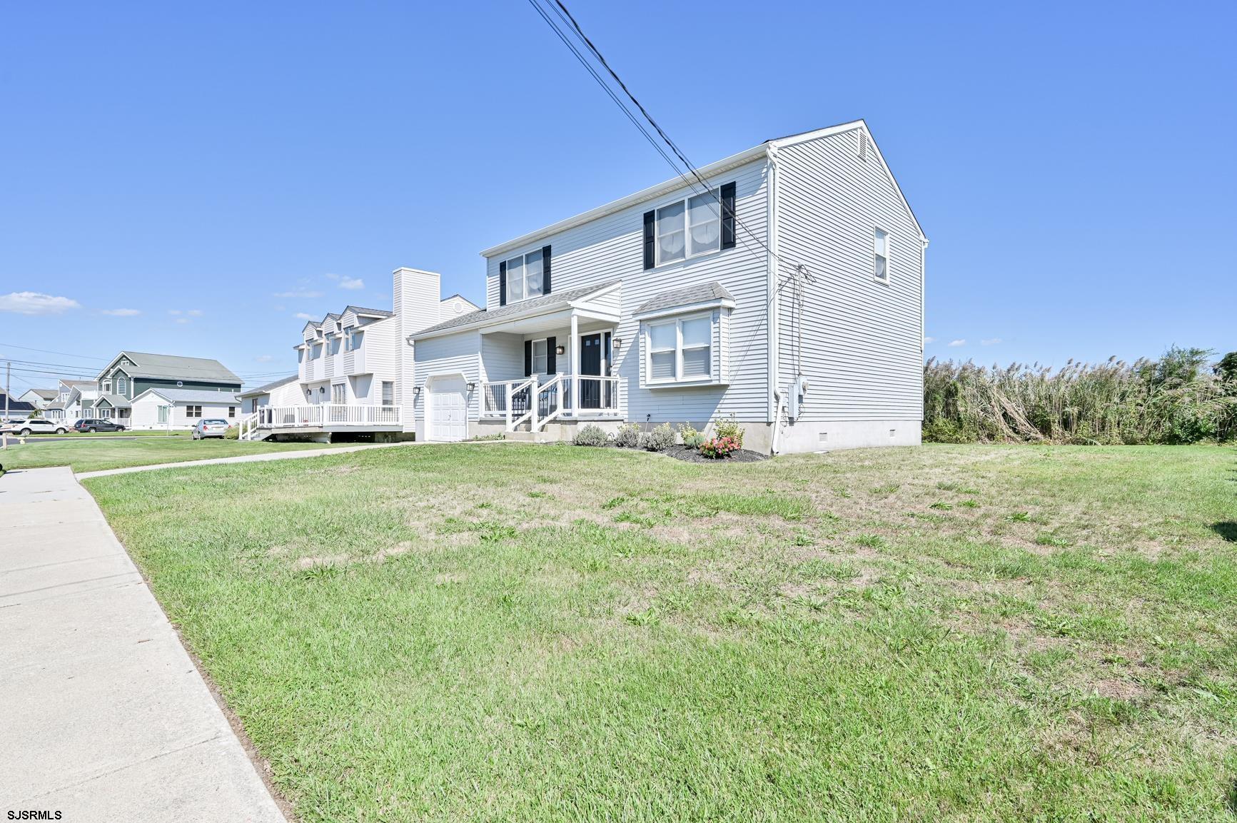 221 Hagen Road Brigantine, NJ 08203 - Photo 2 of 32 a view of a house with big yard