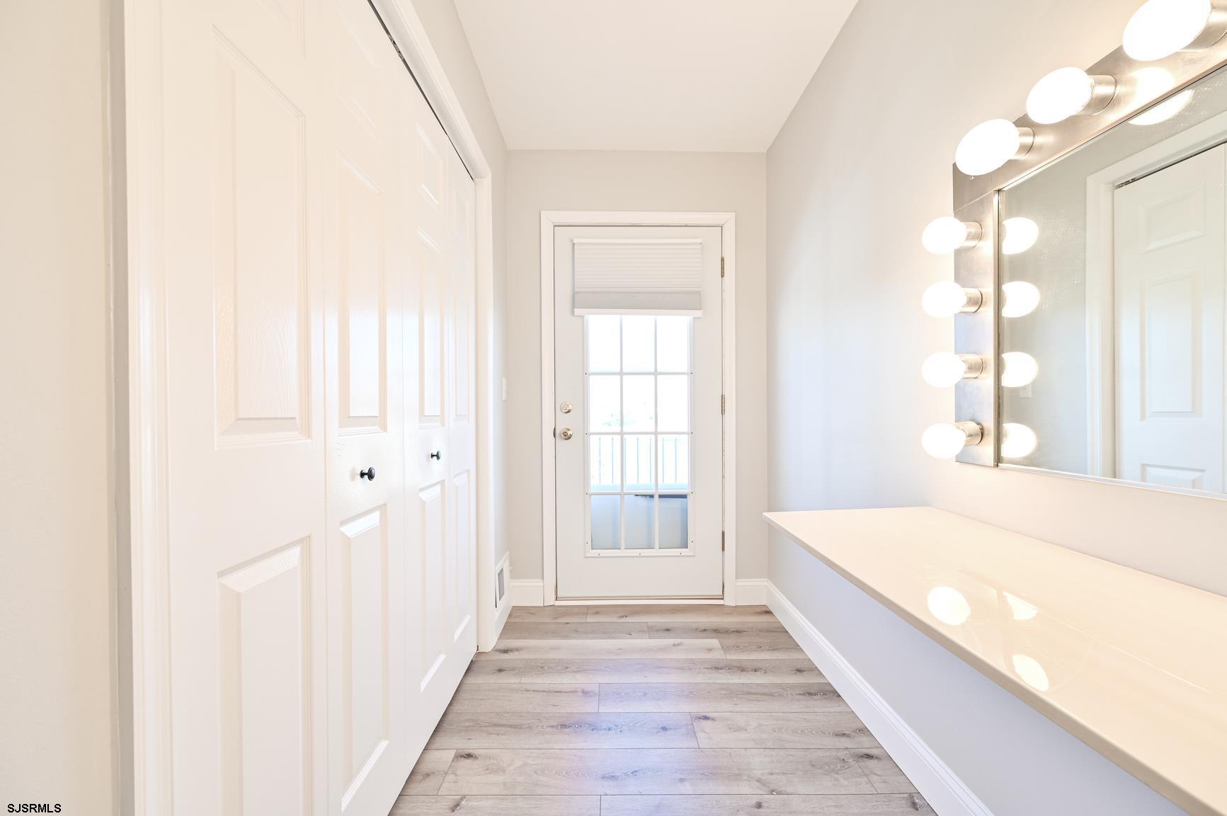 221 Hagen Road Brigantine, NJ 08203 - Photo 22 of 32 a large space with a bed and wooden floor