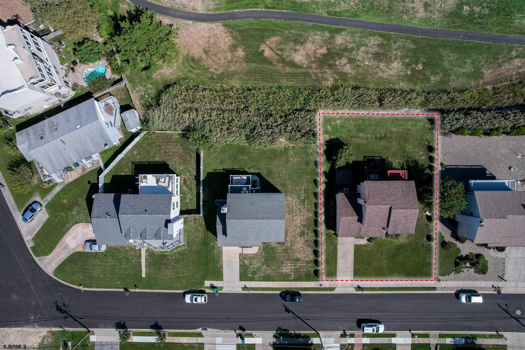 221 Hagen Road Brigantine, NJ 08203 - Photo 30 of 32 an aerial view of a house with a yard and a fountain