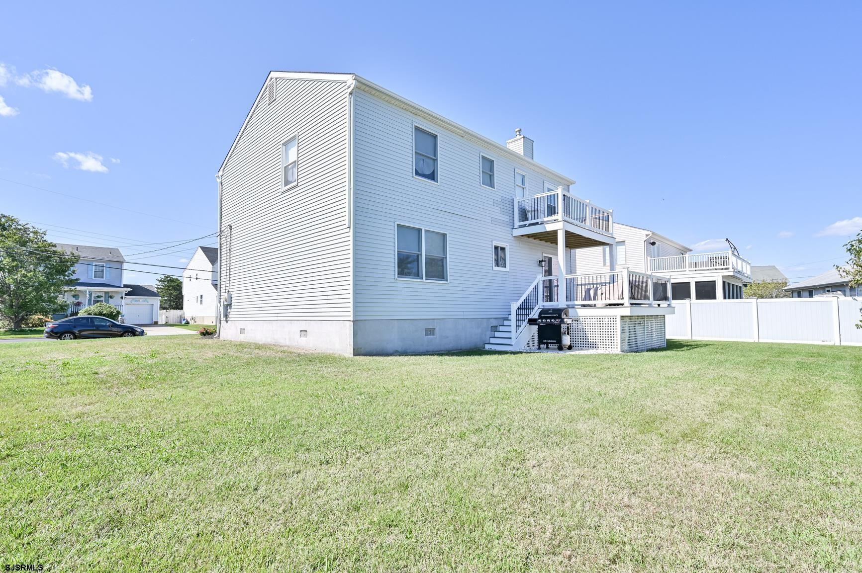 221 Hagen Road Brigantine, NJ 08203 - Photo 3 of 32 a house view with a garden space