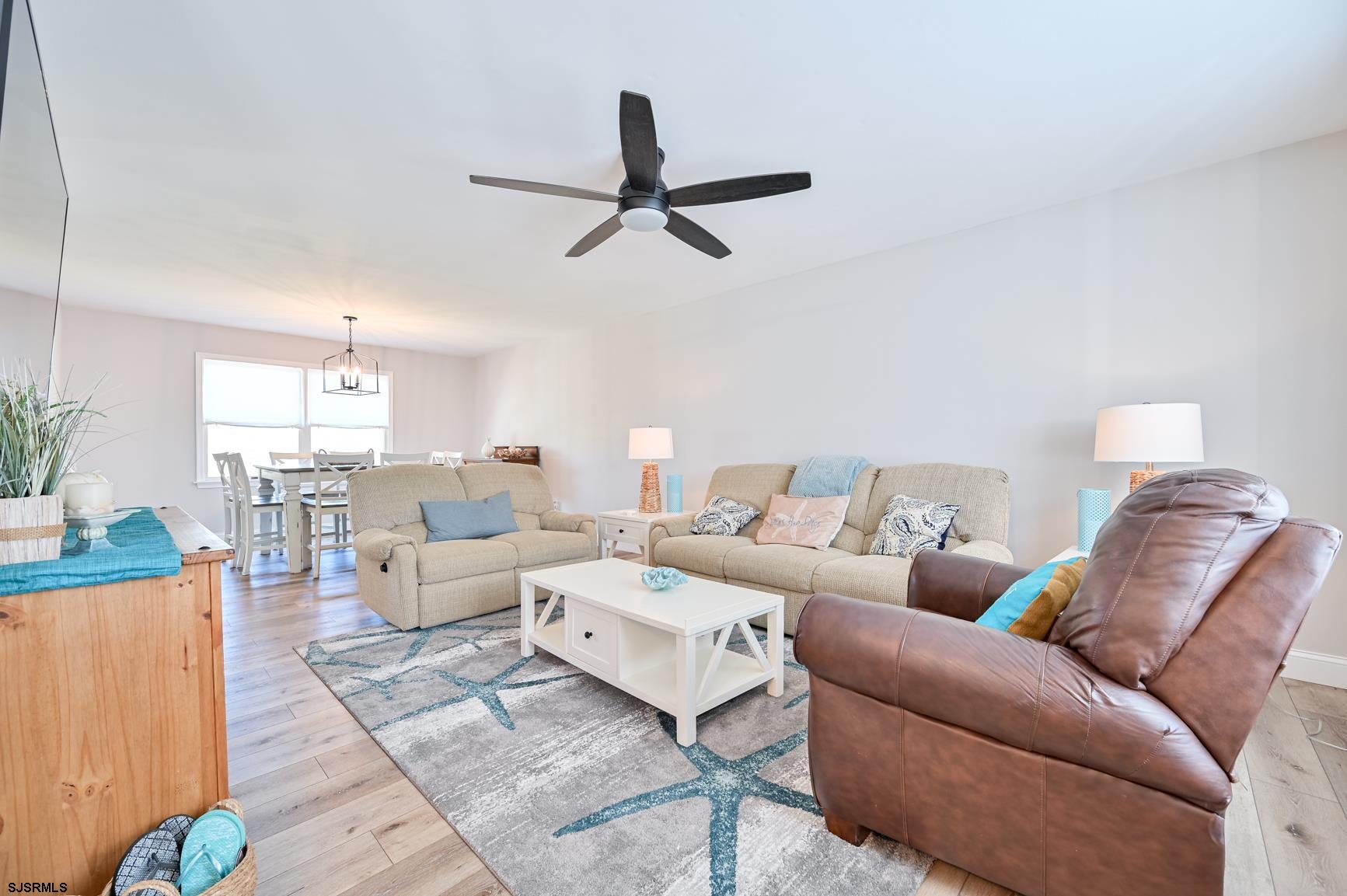 221 Hagen Road Brigantine, NJ 08203 - Photo 9 of 32 a living room with furniture and a window