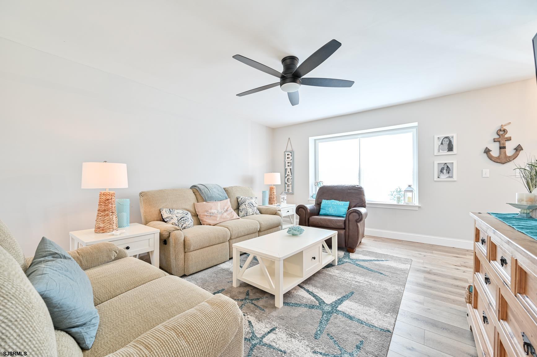 221 Hagen Road Brigantine, NJ 08203 - Photo 10 of 32 a living room with furniture and a window