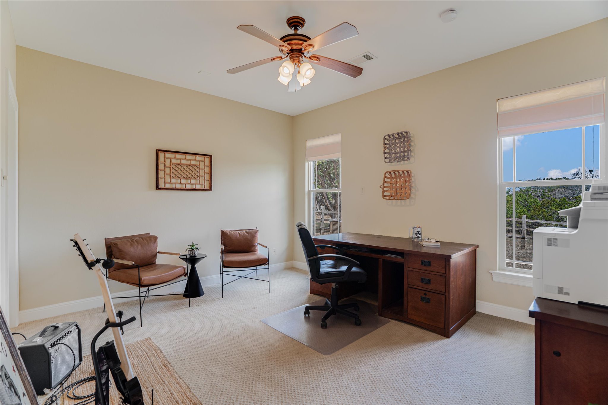 3501 Pursley Road Dripping Springs, TX 78620 - Photo 12 of 38 a view of a workspace with furniture and a workspace