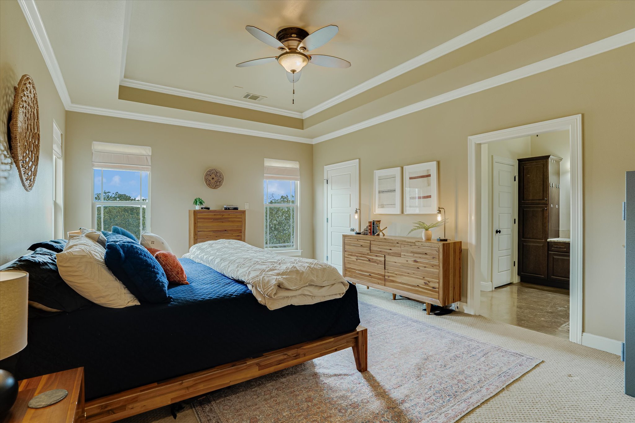 3501 Pursley Road Dripping Springs, TX 78620 - Photo 13 of 38 a bedroom with a bed and ceiling fan