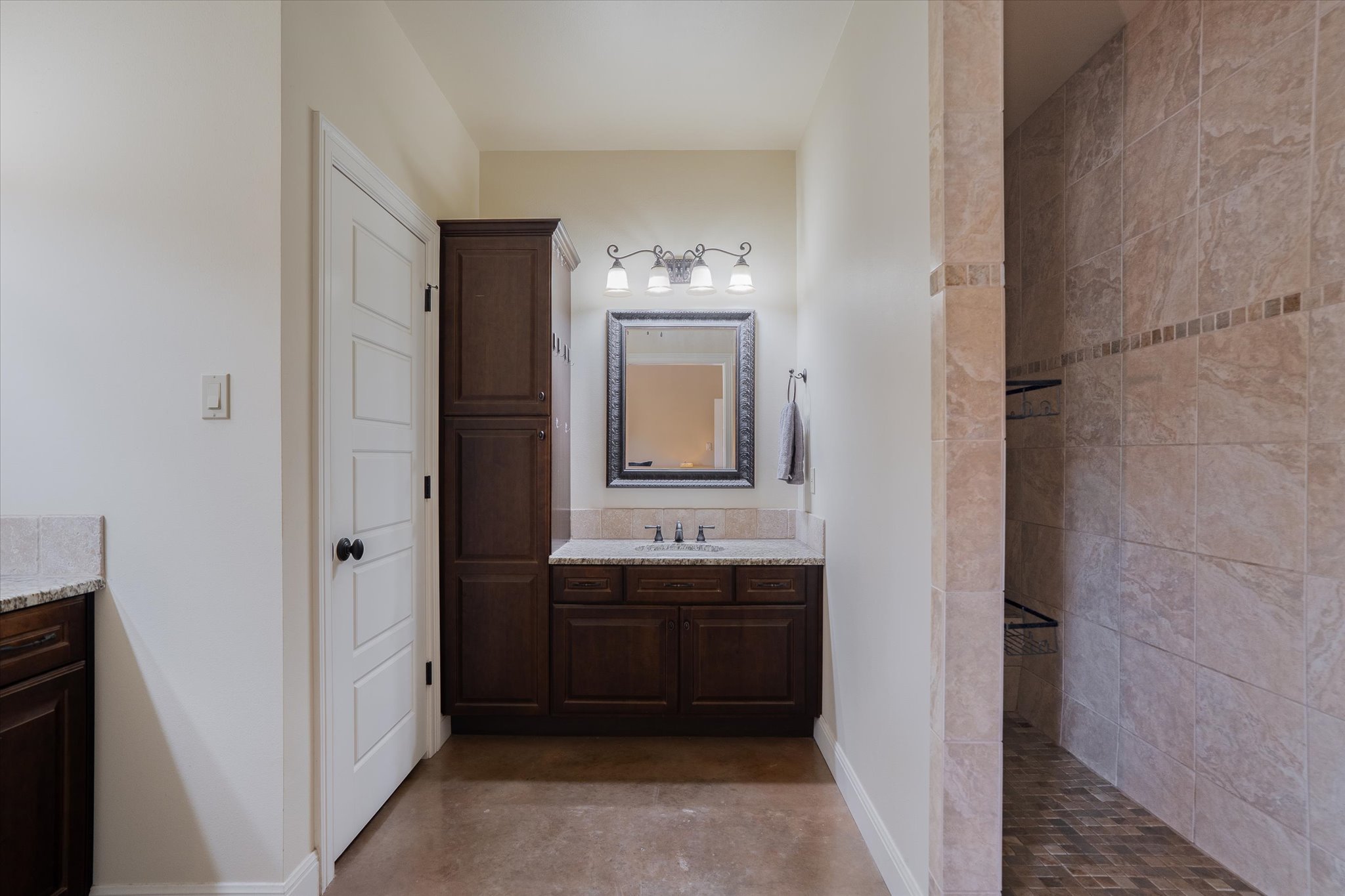 3501 Pursley Road Dripping Springs, TX 78620 - Photo 15 of 38 a bathroom with a sink and a mirror
