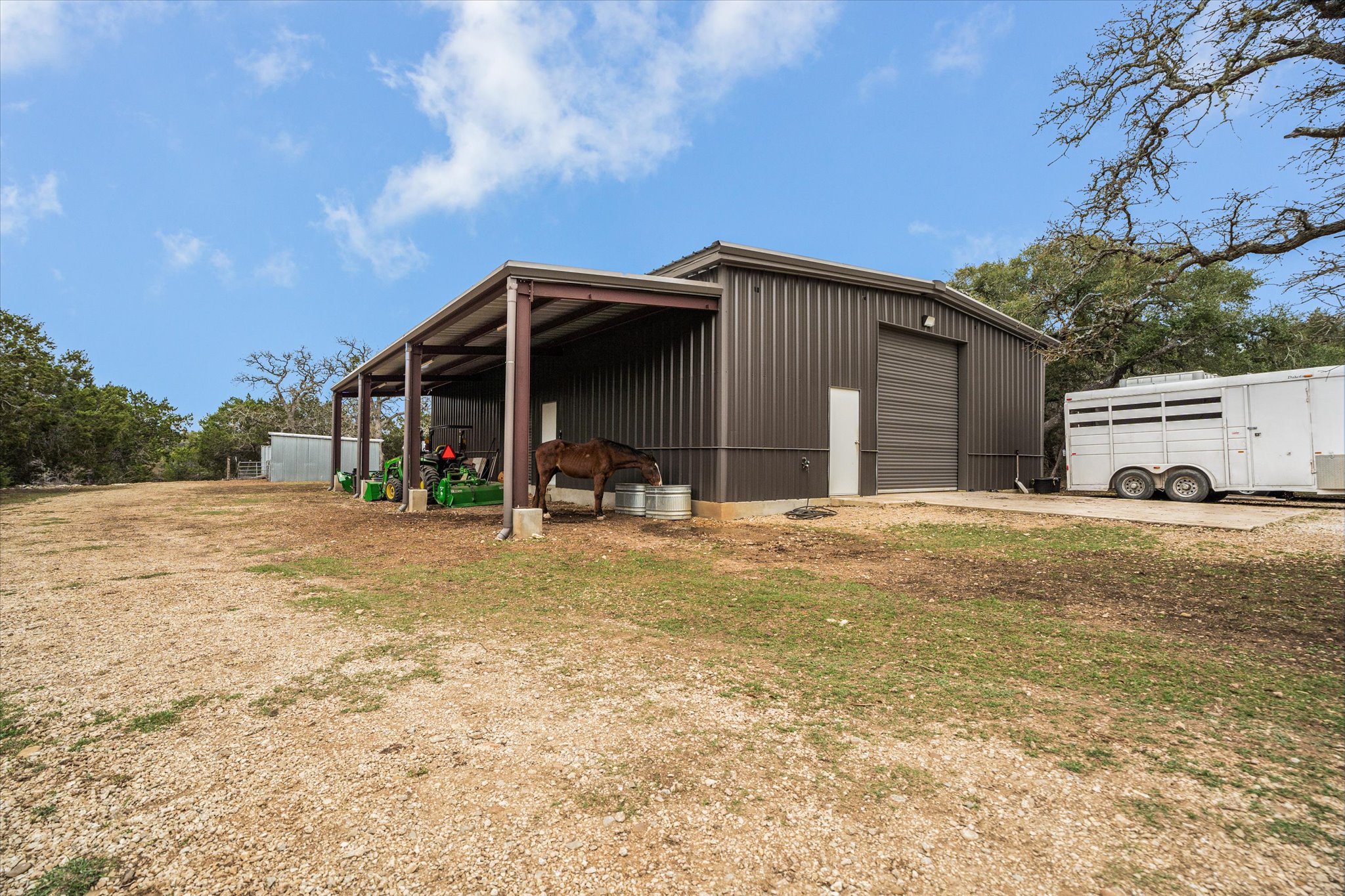3501 Pursley Road Dripping Springs, TX 78620 - Photo 21 of 38 a view of a house with backyard and trees
