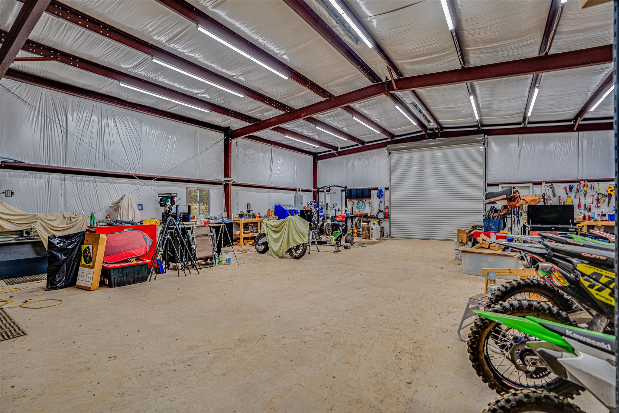 3501 Pursley Road Dripping Springs, TX 78620 - Photo 22 of 38 a view of a storage room with lots of stuff