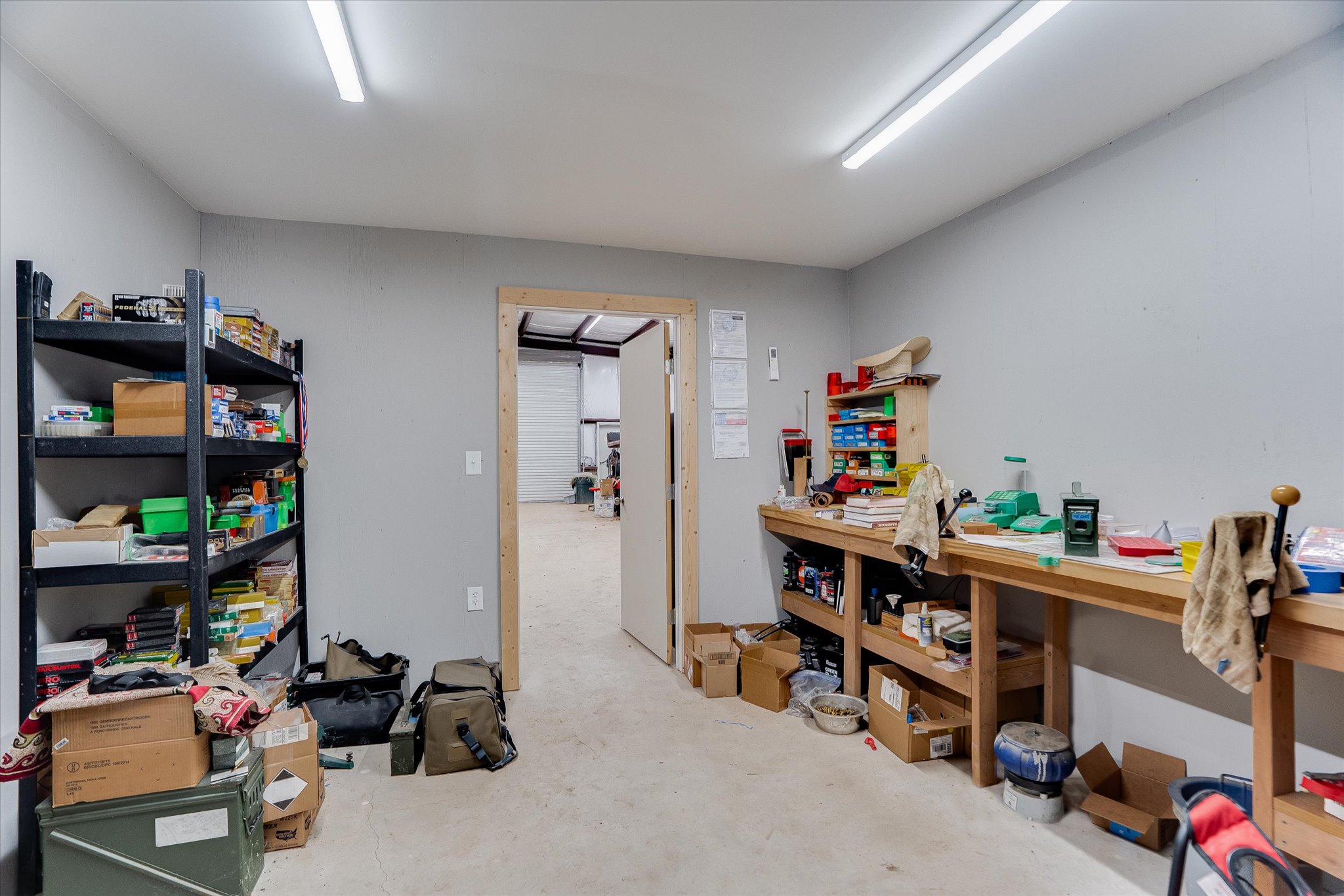 3501 Pursley Road Dripping Springs, TX 78620 - Photo 23 of 38 a room with furniture and a book shelf