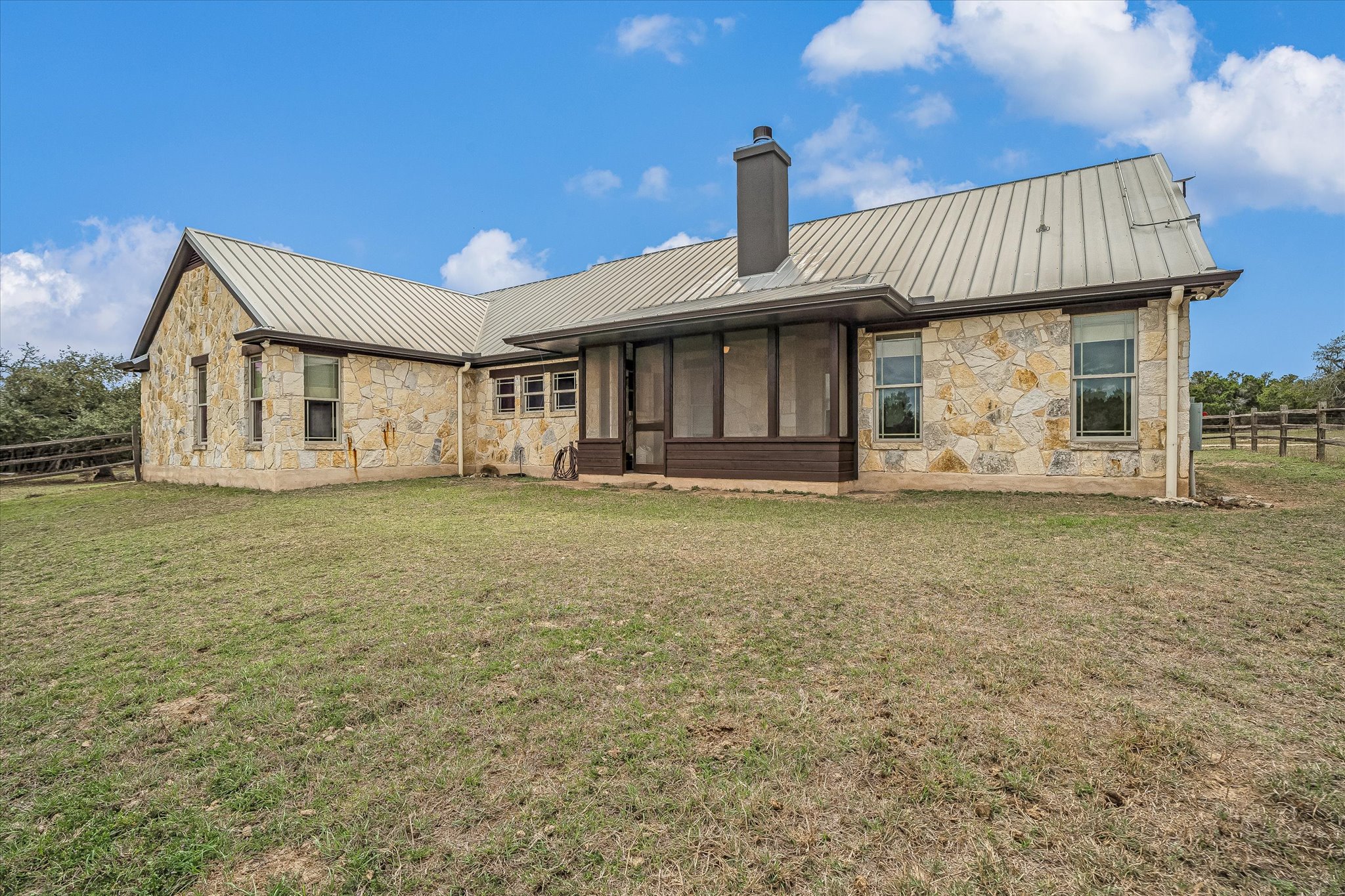 3501 Pursley Road Dripping Springs, TX 78620 - Photo 25 of 38 a front view of a house with garden