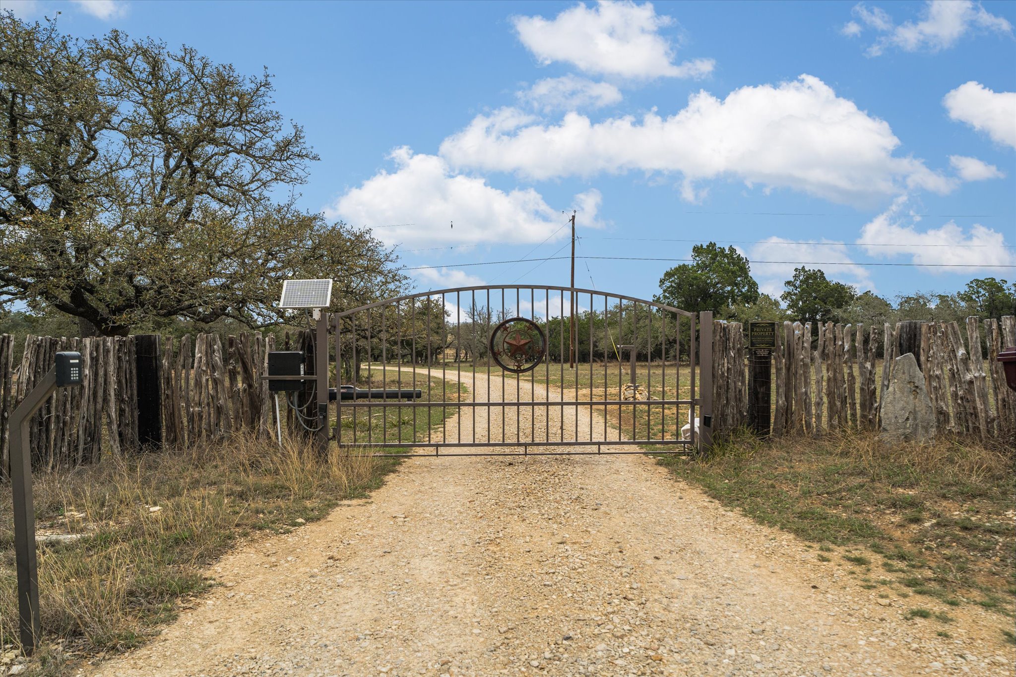 3501 Pursley Road Dripping Springs, TX 78620 - Photo 35 of 38 a view of a yard with wooden fence