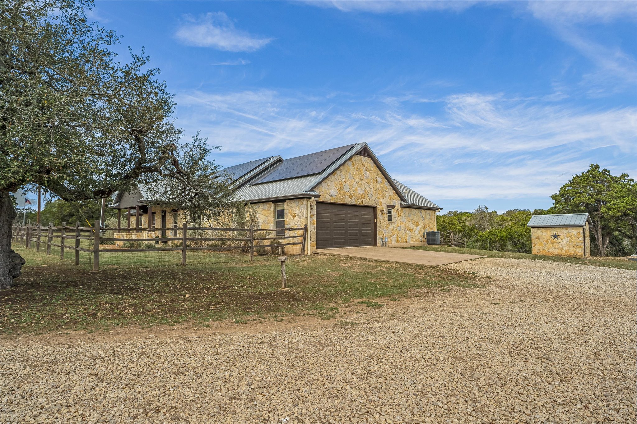 3501 Pursley Road Dripping Springs, TX 78620 - Photo 38 of 38 a view of big yard in front of a house with large trees