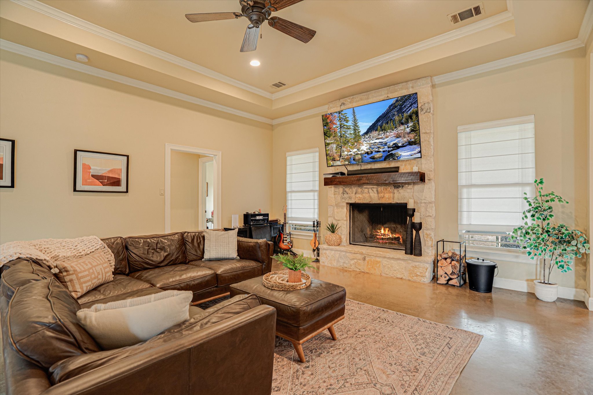 3501 Pursley Road Dripping Springs, TX 78620 - Photo 5 of 38 a living room with furniture and a fireplace
