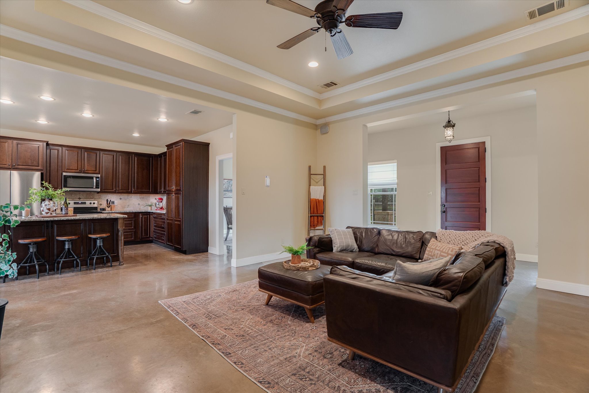 3501 Pursley Road Dripping Springs, TX 78620 - Photo 6 of 38 a living room with furniture and kitchen view