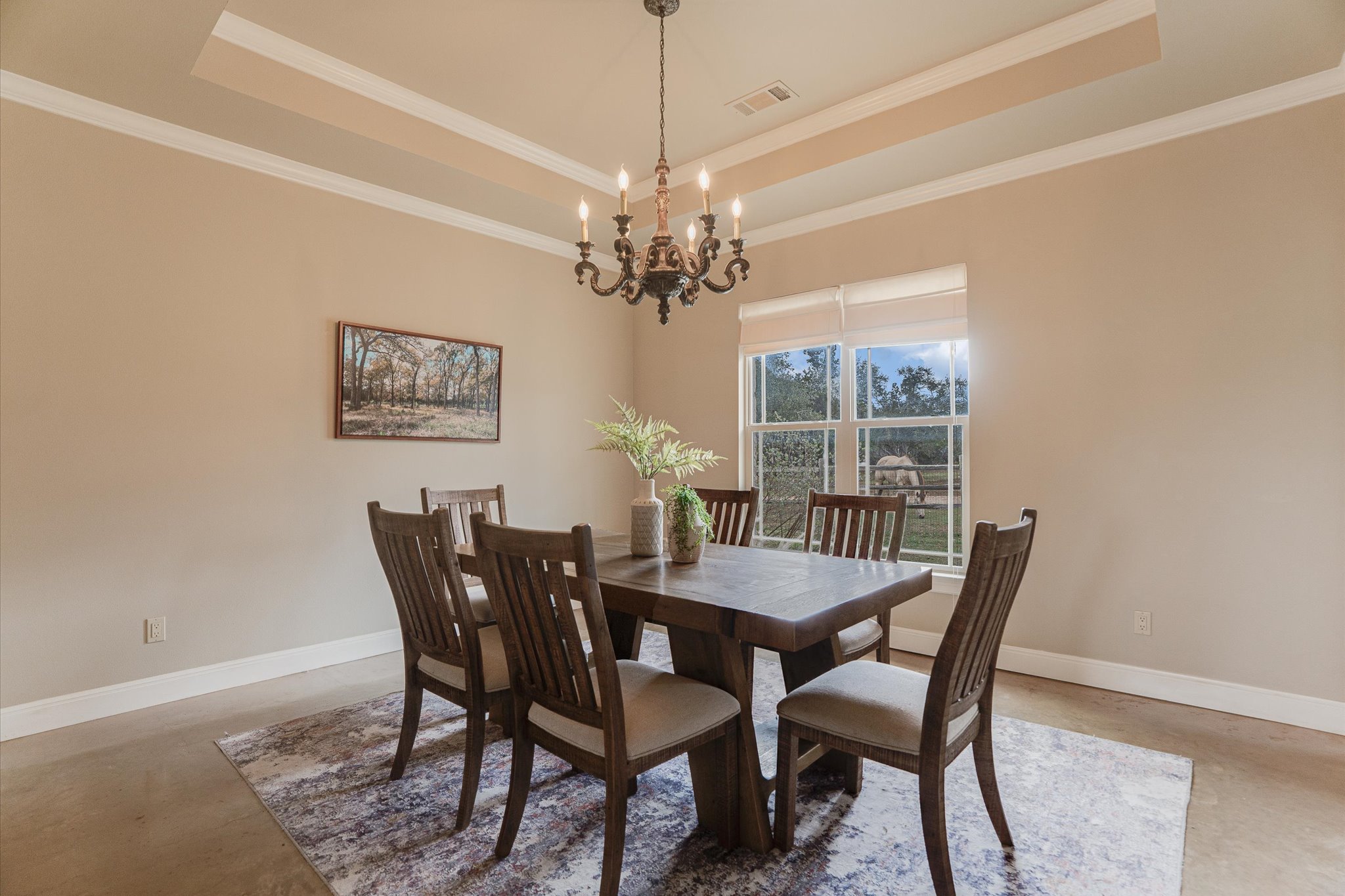 3501 Pursley Road Dripping Springs, TX 78620 - Photo 8 of 38 a view of a dining room with furniture and a chandelier