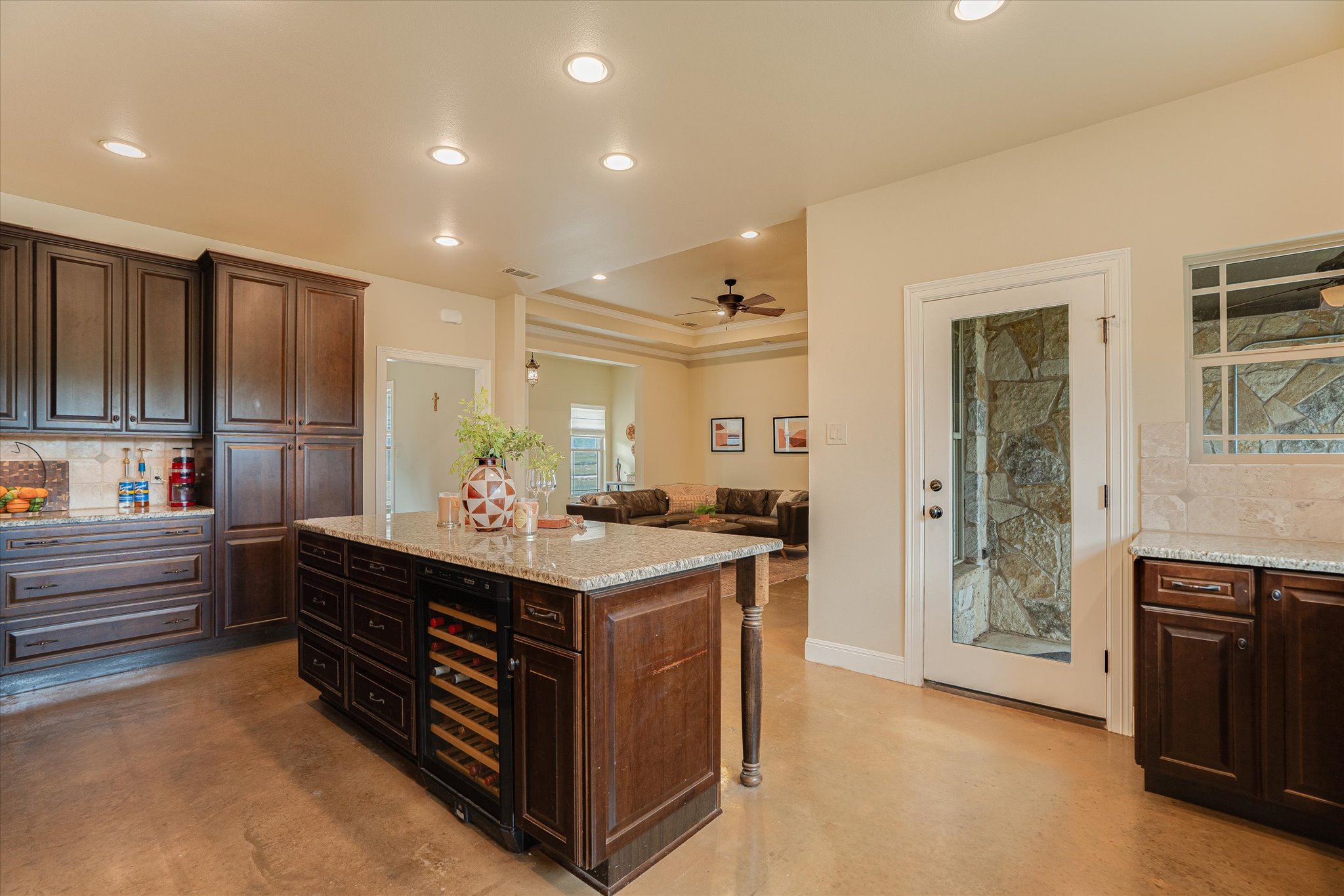 3501 Pursley Road Dripping Springs, TX 78620 - Photo 10 of 38 a kitchen with kitchen island a sink stove and refrigerator