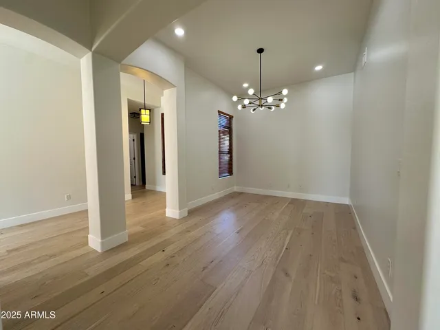 a view of a livingroom with wooden floor