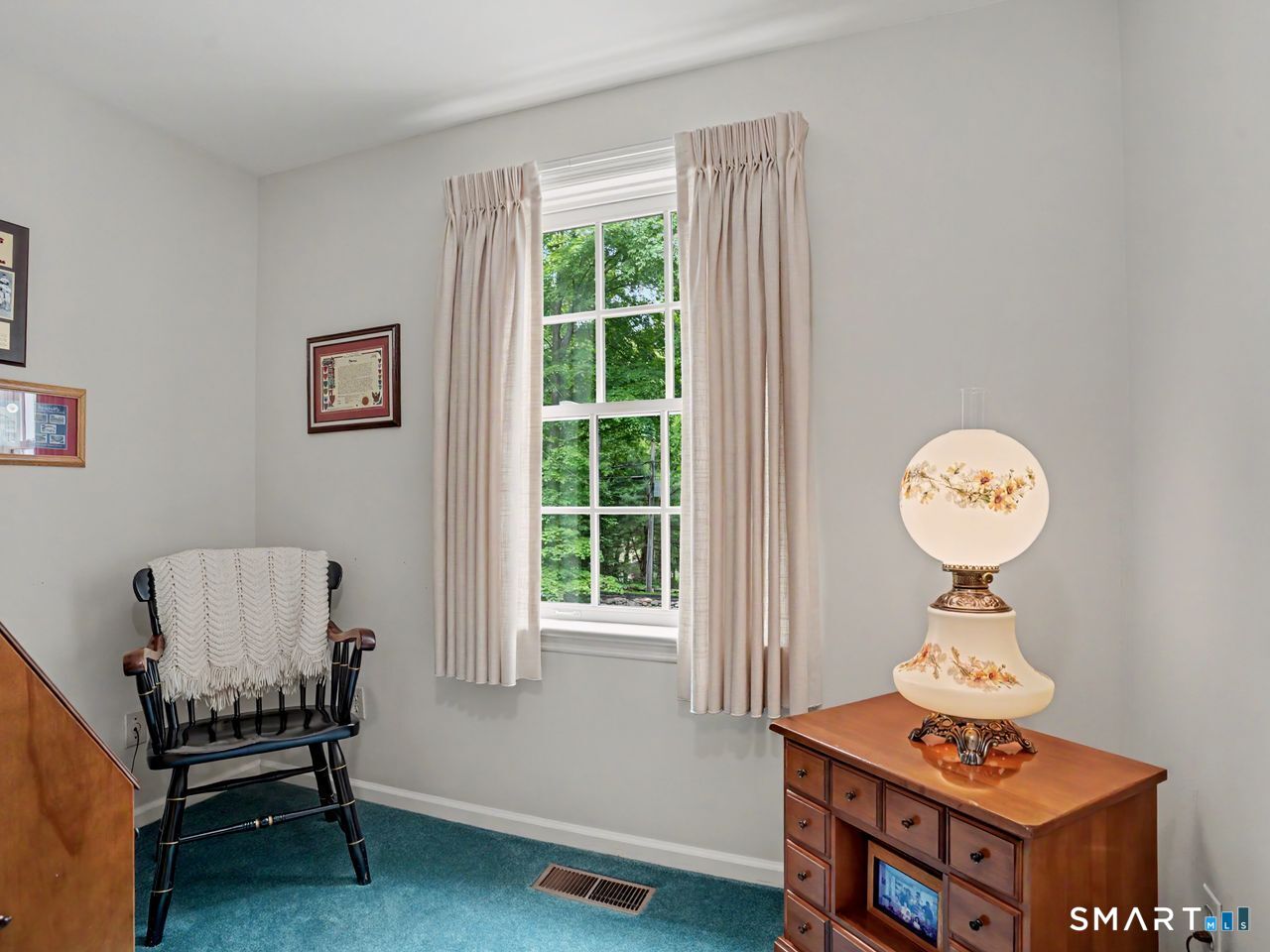 86 Fire Hill Road Redding, CT 06896 - Photo 18 of 36 a view of a workspace with furniture and a window