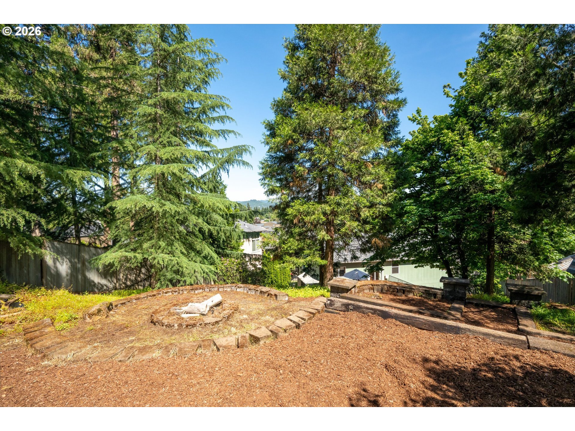 277 South 67th Court Springfield, OR 97478 - Photo 35 of 44 a view of a yard with a tree